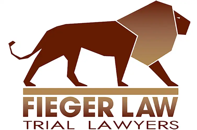 Fieger Law logo featuring a stylized lion illustration representing strength and justice for personal injury and trial law services.